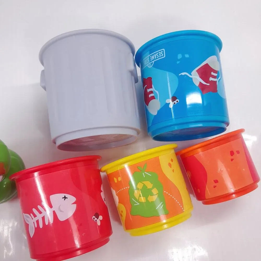 Bright Starts Sesame Street Oscar the Grouch's Stacking Cans nesting baby toy